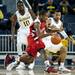 Michigan sophomore Trey Burke defends a Saginaw Valley State player Chris Webb on Monday. Daniel Brenner I AnnArbor.com